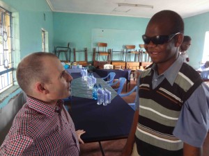 Alan Foley and KU Student Mandela talking at Kibos School
